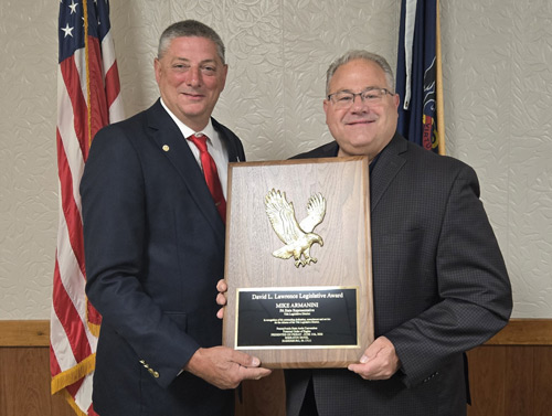 The photo depicts Armanini, right, and State Aerie President Mike Delio. 
